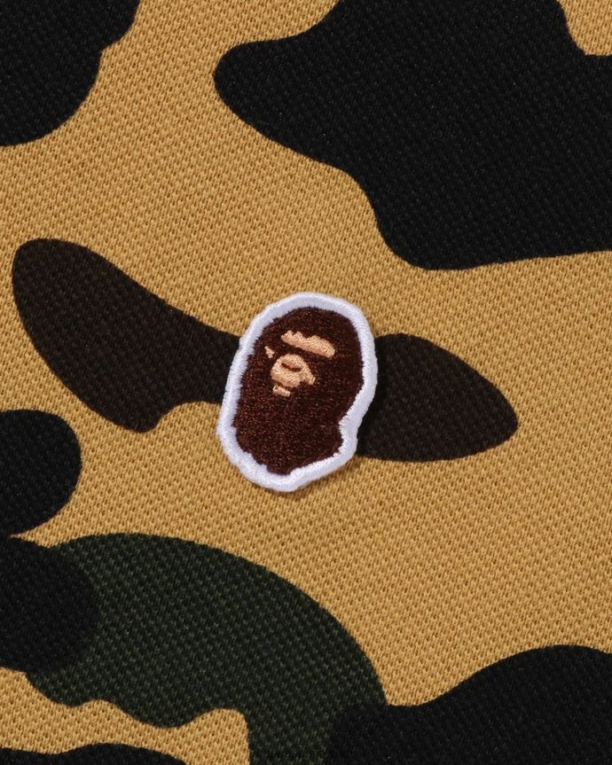 hombres A Bathing Ape Polo de ajuste holgado de un punto de camuflaje 1st 288PLL6 amarillo suave