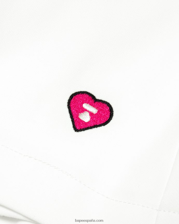mujer A Bathing Ape minifalda plisada 288PLL969 pared blanca